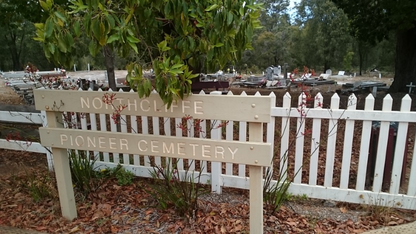Graves, fence and signage at Northcliffe Cemetery