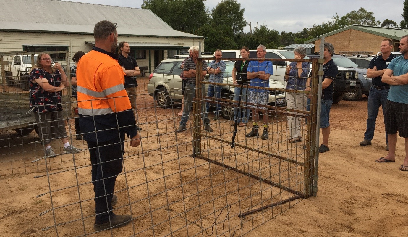 Participants at pest control workshop in Northcliffe, standing outside listening to speaker