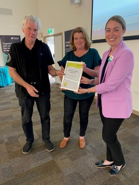 Councillors Eiby and Lawrence receiving dementia friendly community certificate from Dementia Australia