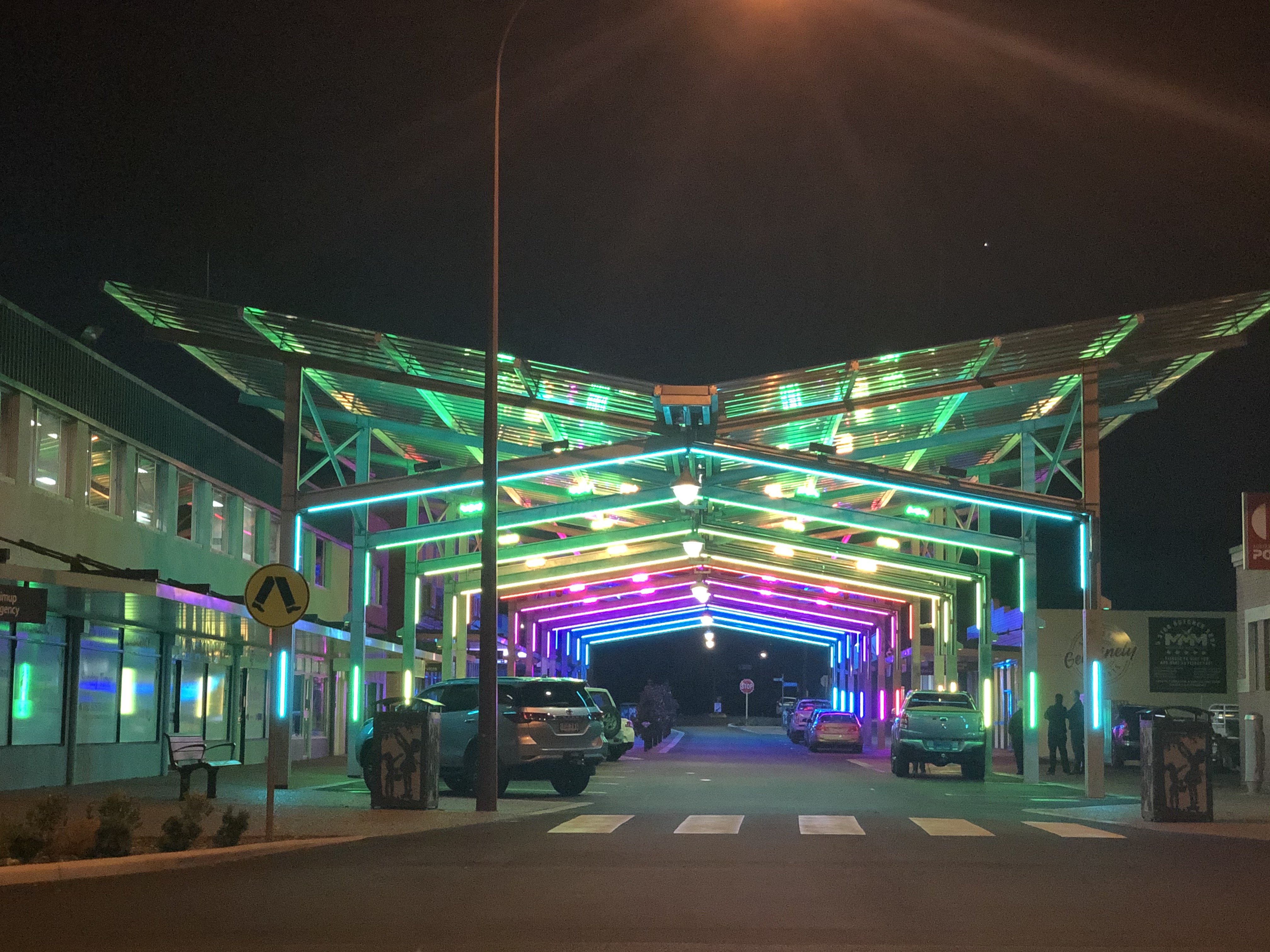 Image of Brockman Street with rainbow coloured light canopy