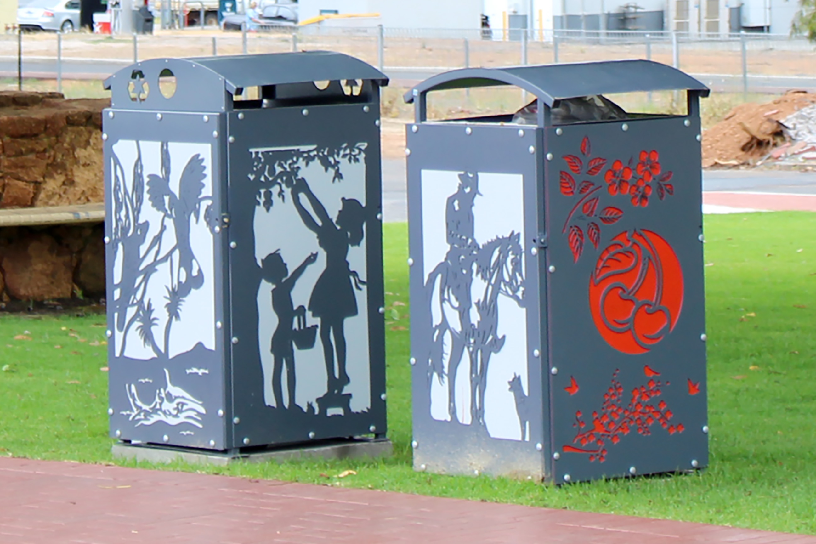 new laser cut design rubbish bin surrounds in Coronation Park