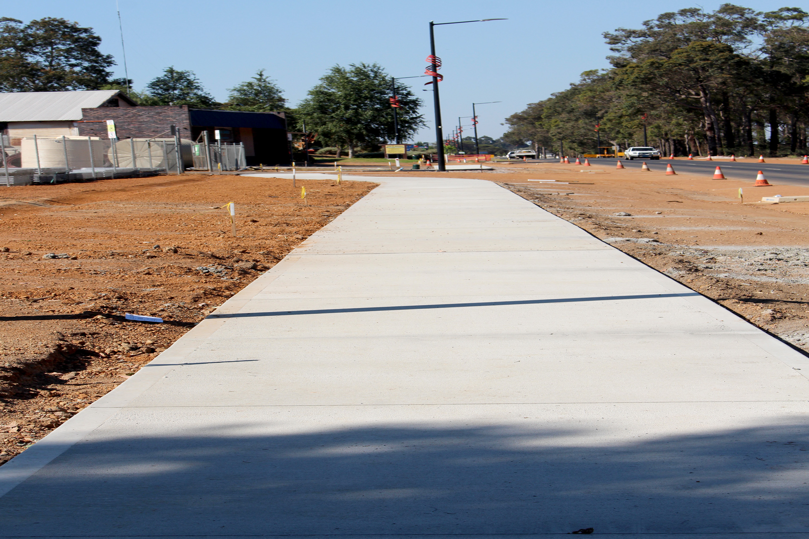 new concrete footpath along Mottram Street
