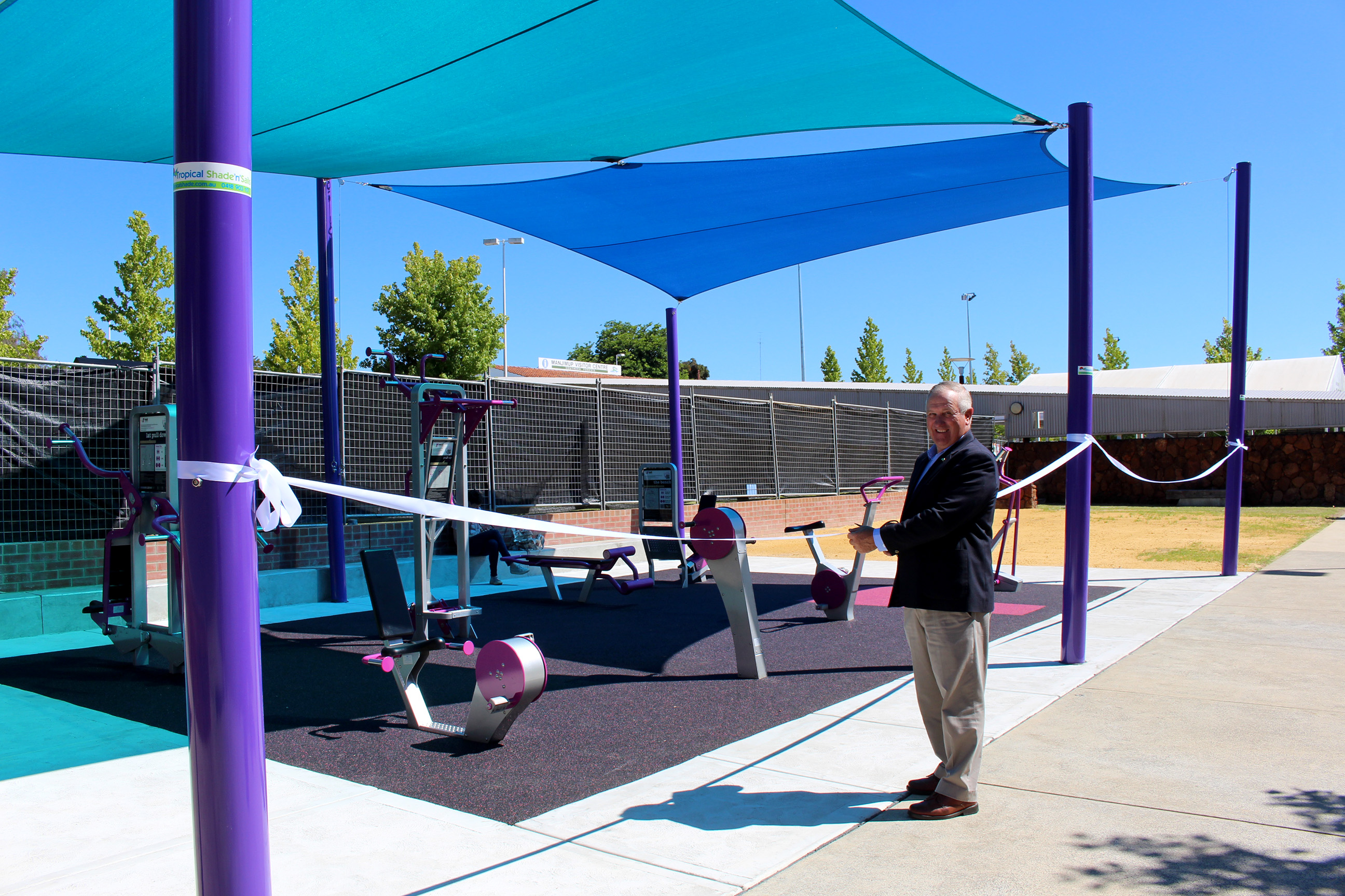 Shire President Paul Omodei cutting the ribbon to open the RealSpaces Outdoor Gym