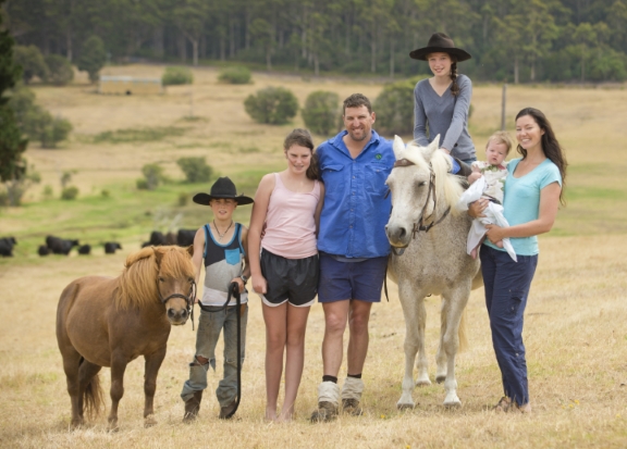 Farming family of six with horse and pony